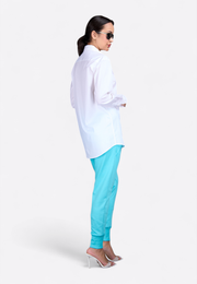 Model wearing white cotton formal shirt, side pose – East Vibe